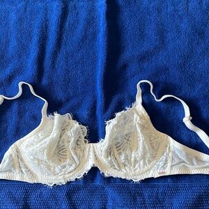 Victoria’s Secret 36D unlined bra.  Cream